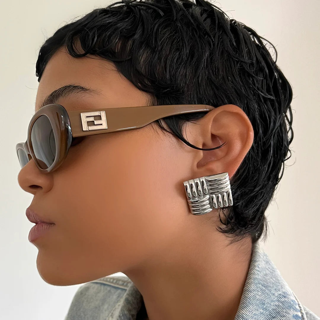 Boucle d'oreille tissée
