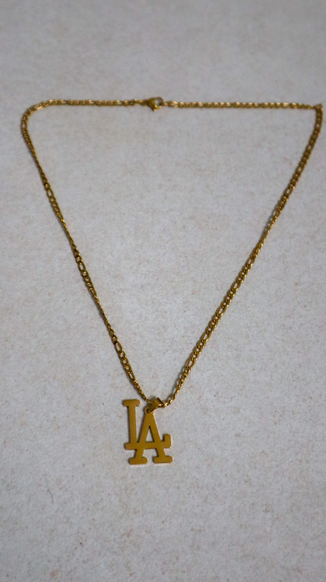Chaîne de la côte ouest de Los Angeles - Or