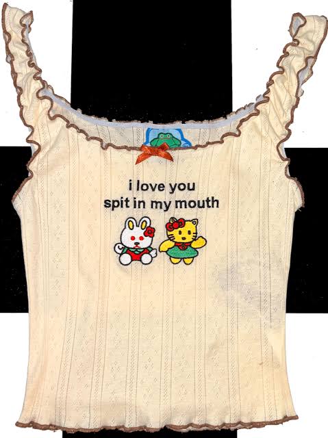 Lingerie top with cartoon characters and text on a plain background