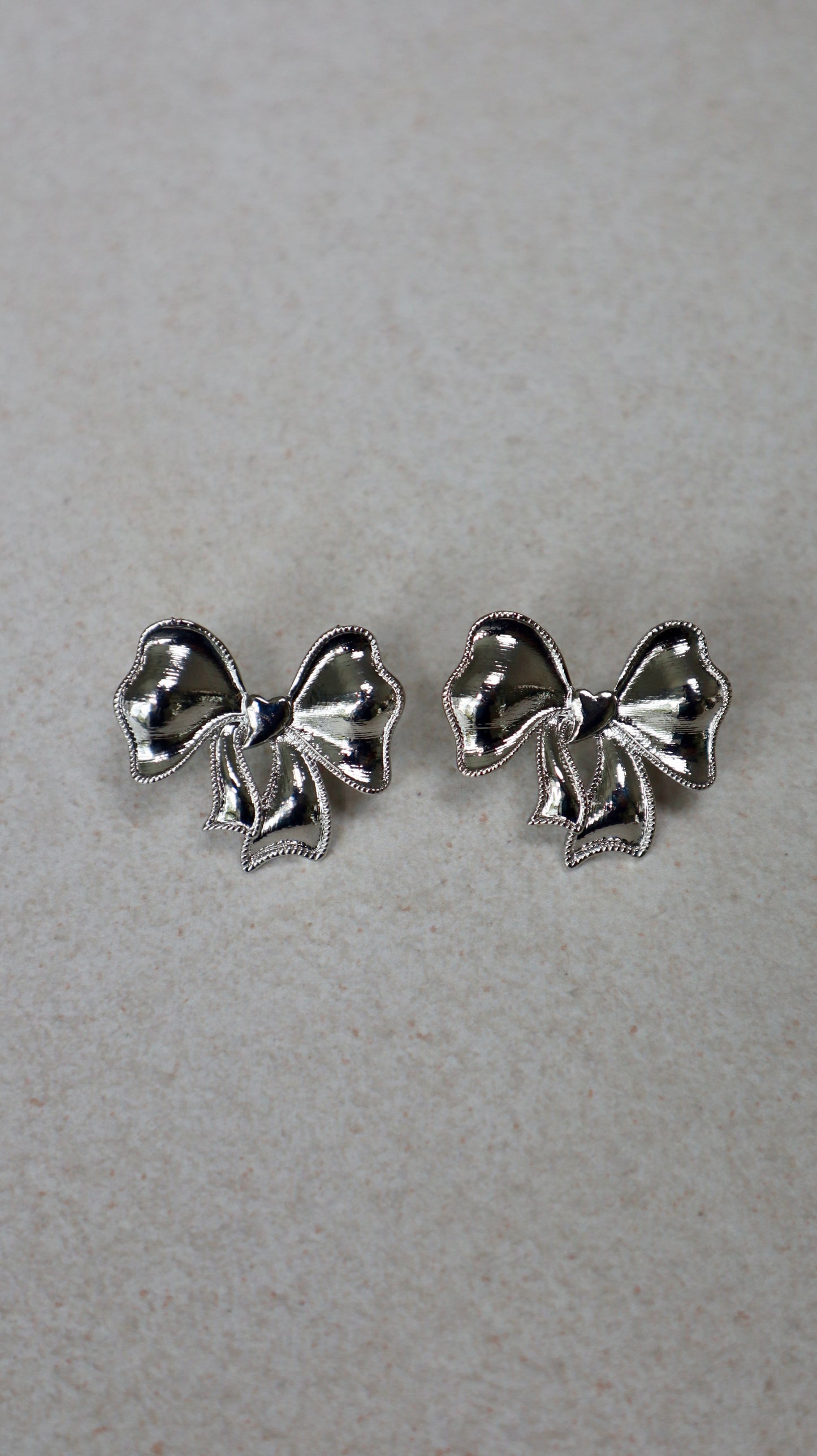 Boucles d'oreilles en argent avec nœud