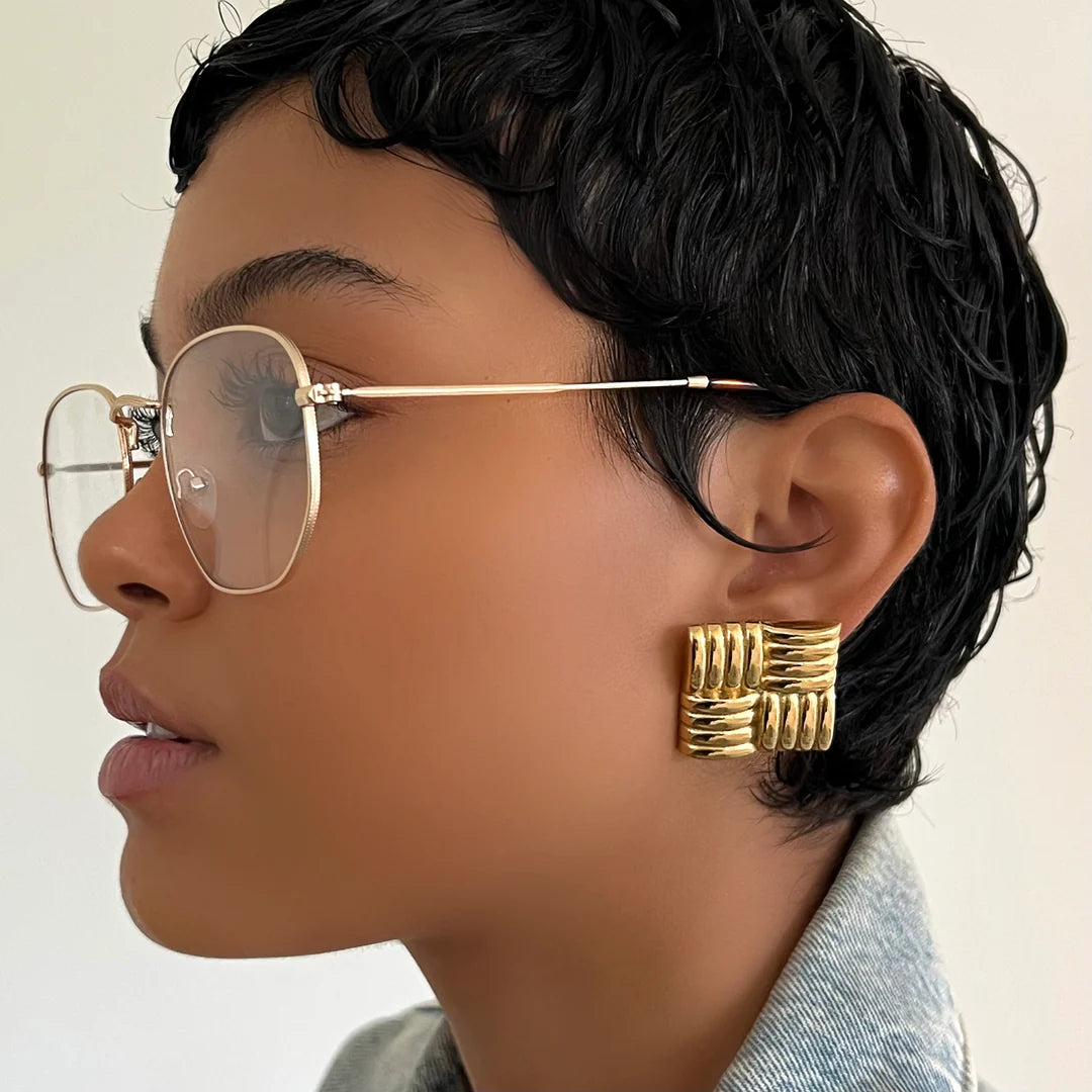 Boucle d'oreille tissée