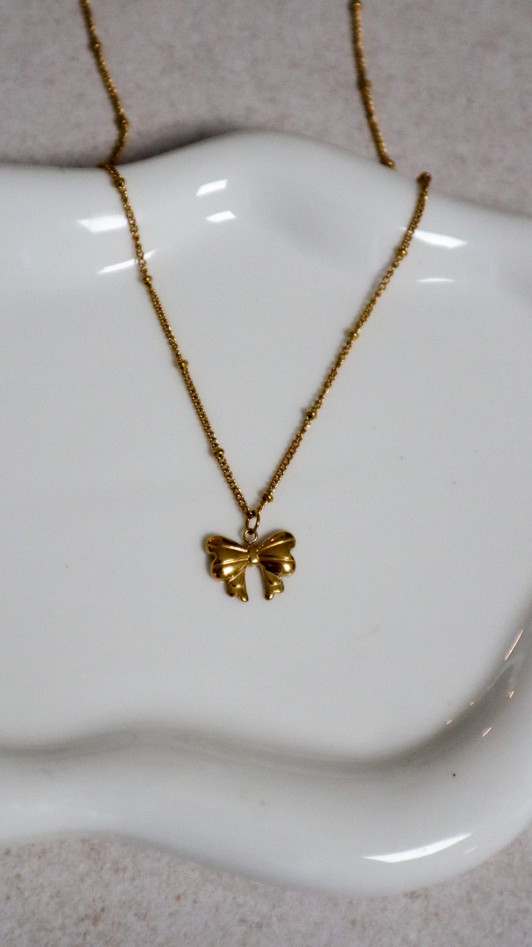 Collier mini nœud