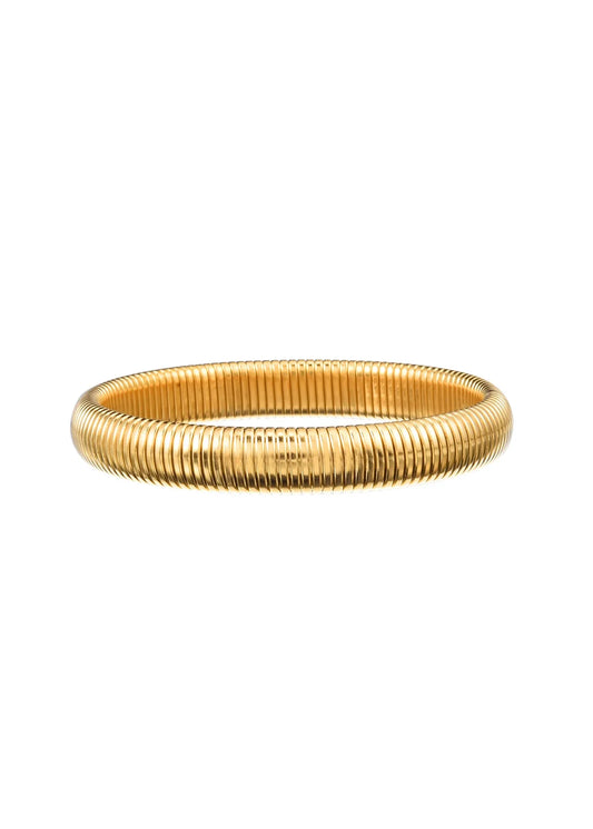 Gold bangle on a white background