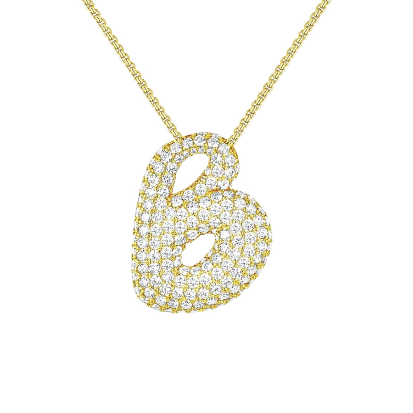 An 18K gold plated initial necklace in the shape of the letter 'B', adorned with small white stones, displayed against a white background.