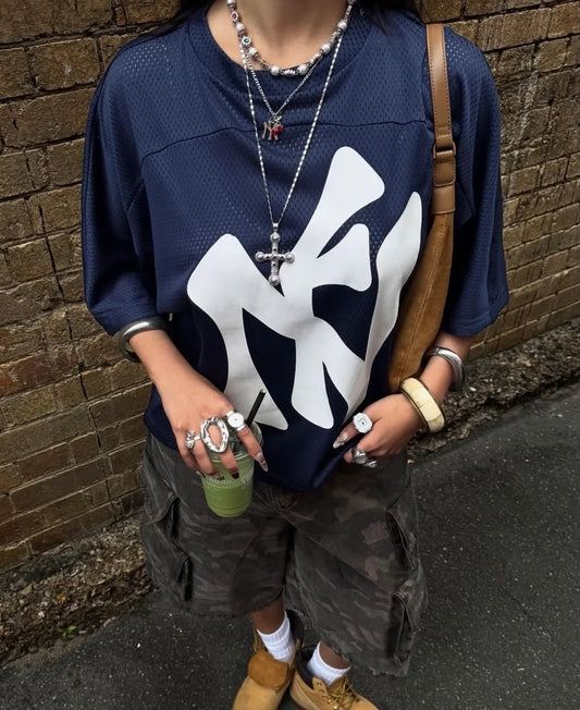 How Viral TikToker Xiao Xiao Wang Styled the Yankee Cherry Bomb Necklace 💋